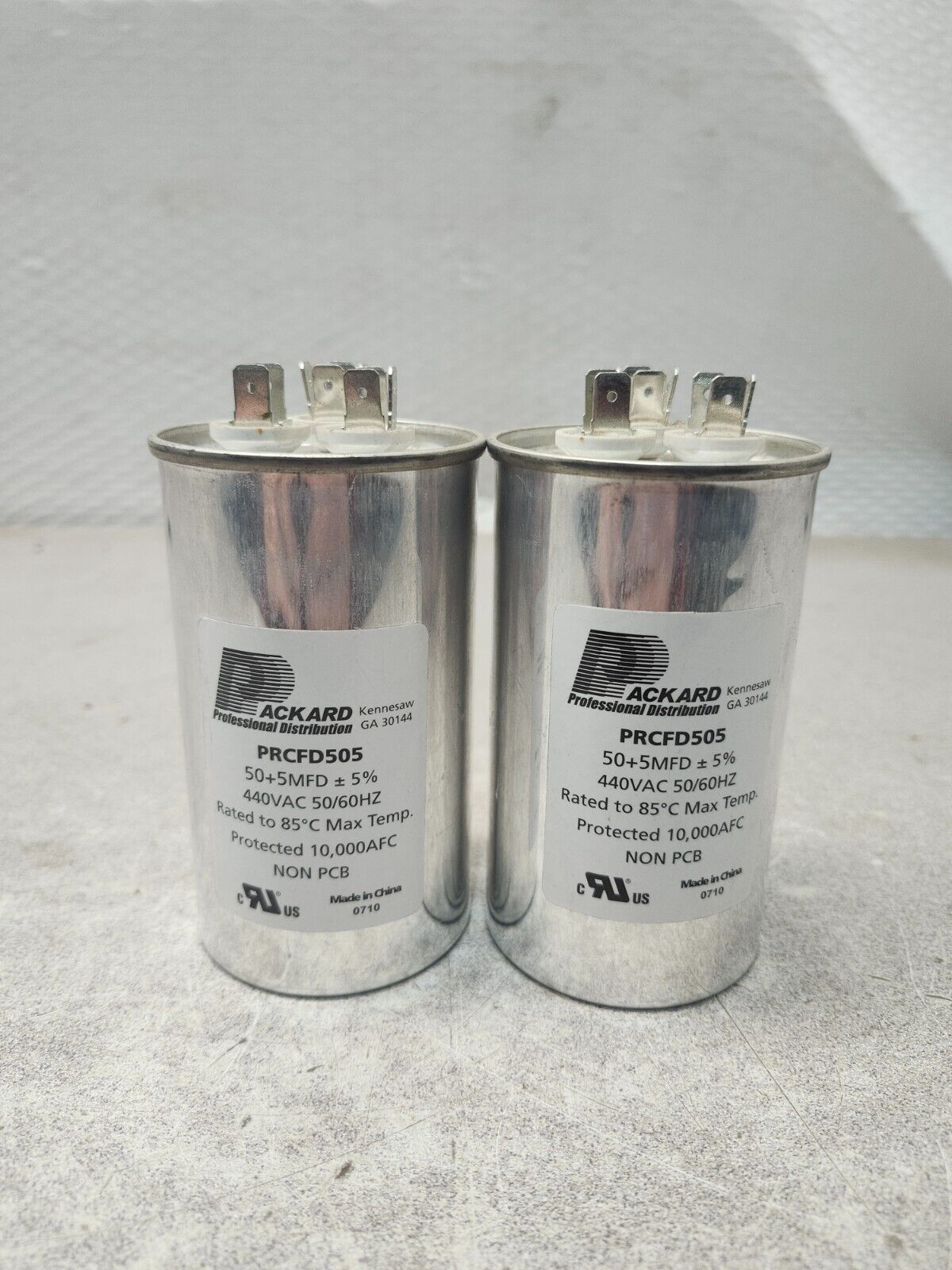 NEW NO BOX Packard Motor Round Dual Run Capacitor PRCFD505