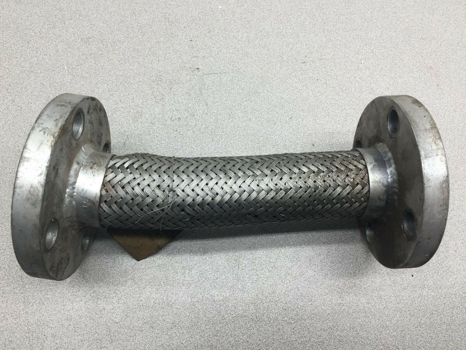 NEW NO BOX 1 1/2" X 10" C/S 4 BOLT FLANGED SS BRAID 150LB PUMP CONNECTOR