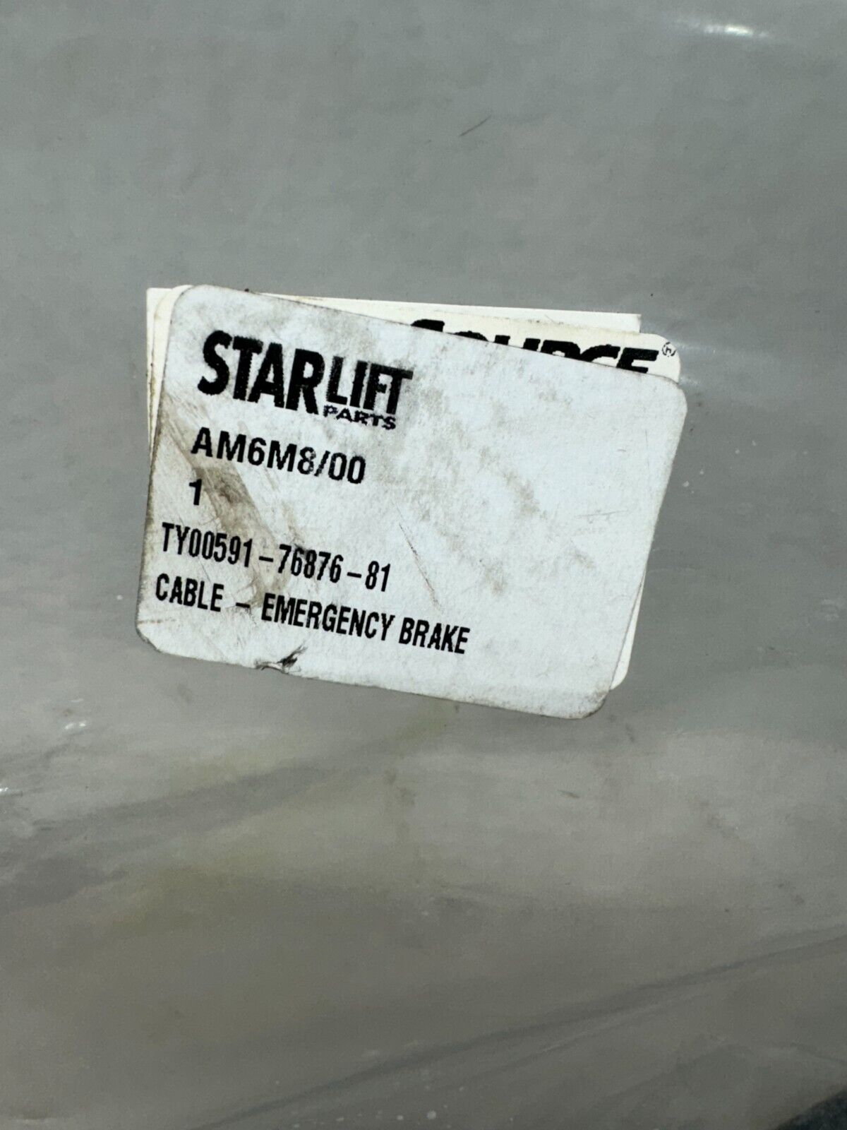 NEW IN PACKAGE STARLIFT CABLE - EMERGENCY BRAKE AM6M8/00 TY00591-76876-81
