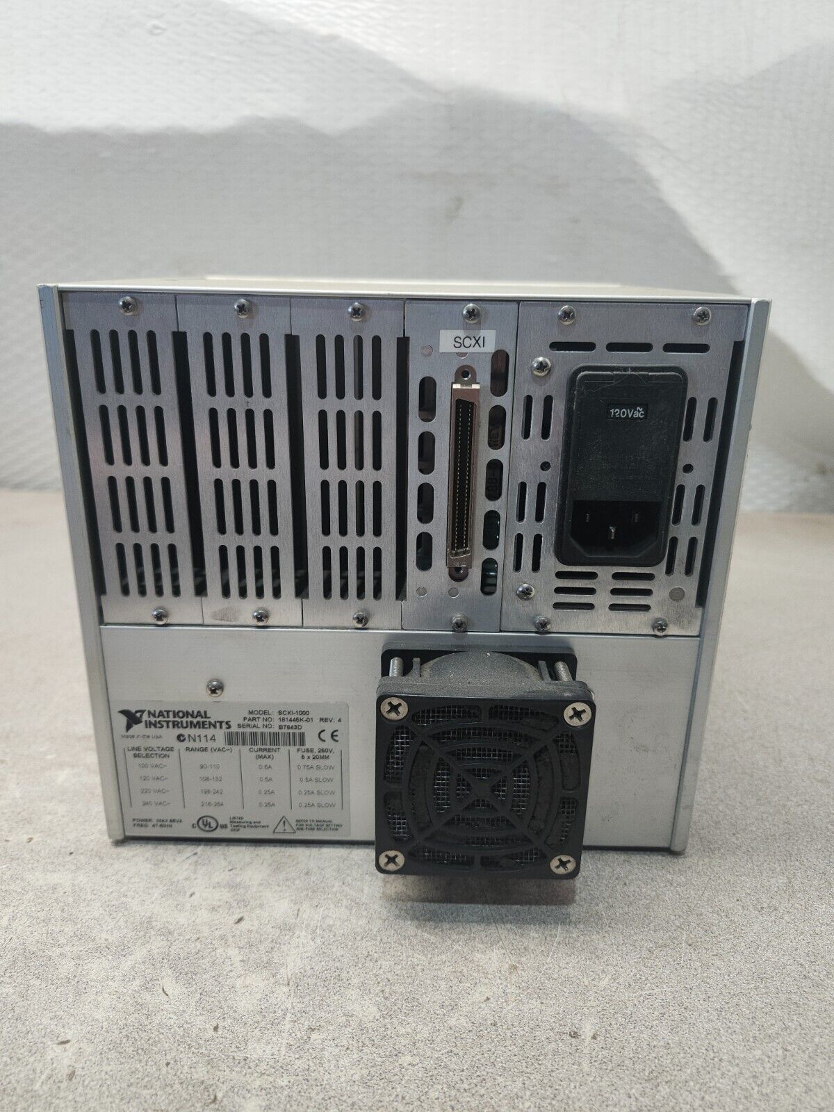 USED  NATIONAL INSTRUMENTS CHASSIS 4 SLOT 100/240VAC SCXI1000
