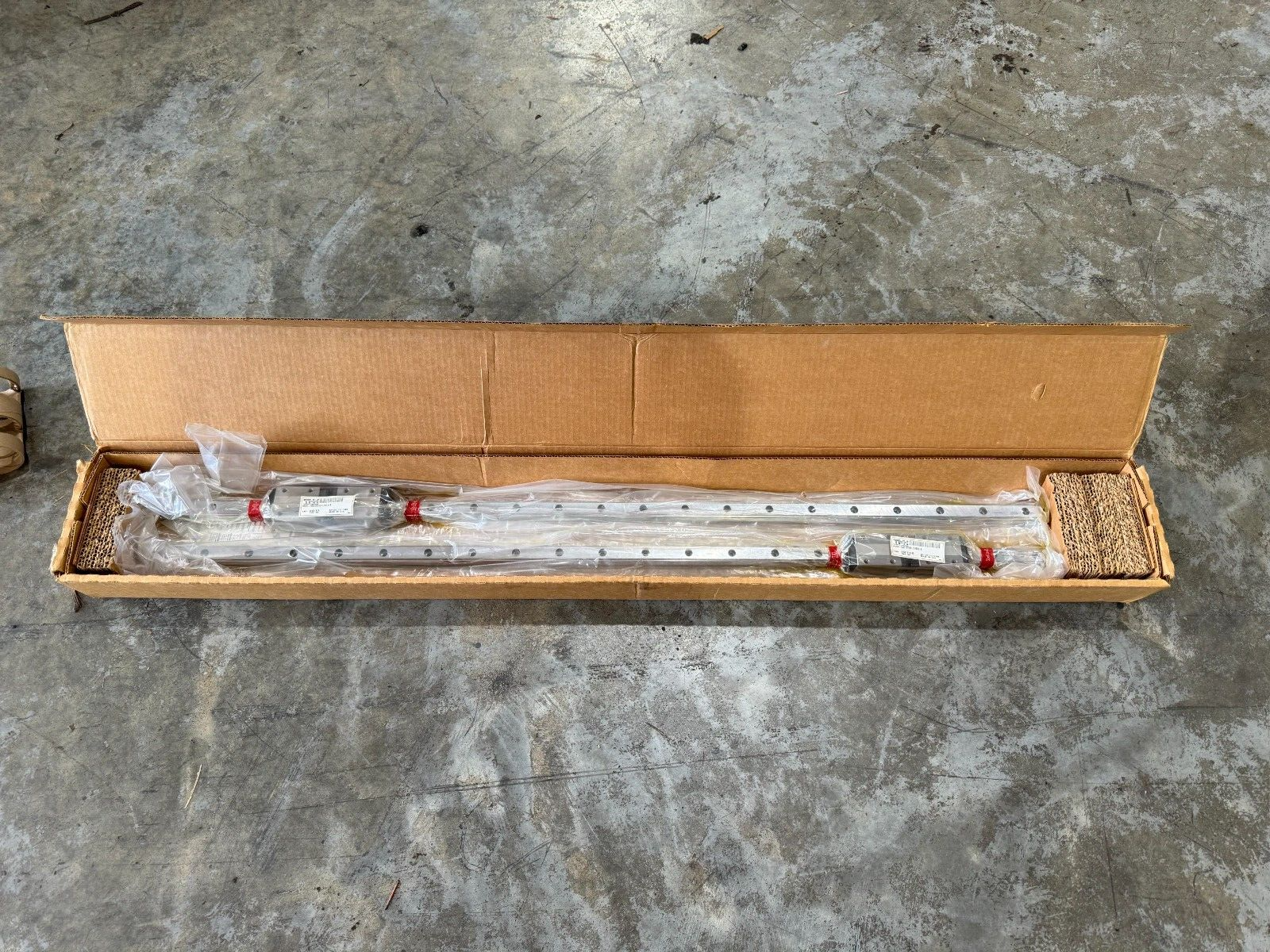 NEW BOX OF 2 THK LINEAR GUIDE RAILS WITH BEARINGS HSR25R2UU+1240LH