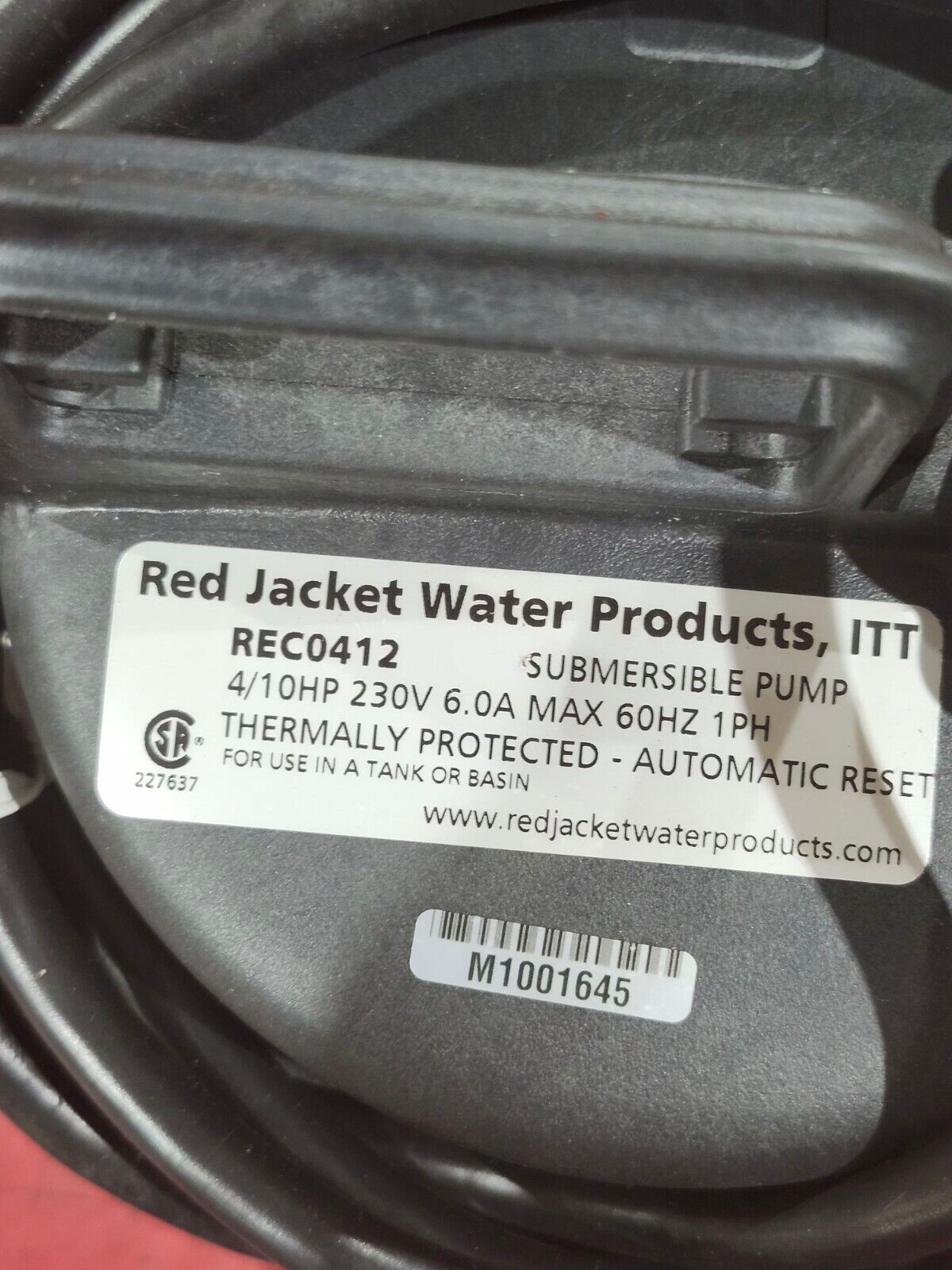 NEW IN BOX ITT RED JACKET 4/10HP 230V. SUBMERSIBLE PUMP REC0412