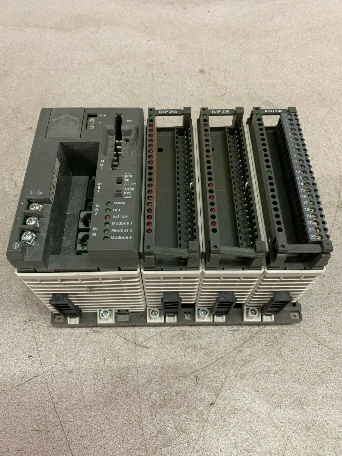 USED SCHNEIDER TSC COMPACT MODICON PLC PC-E984-265 WITH MODULES & BACKPLANE