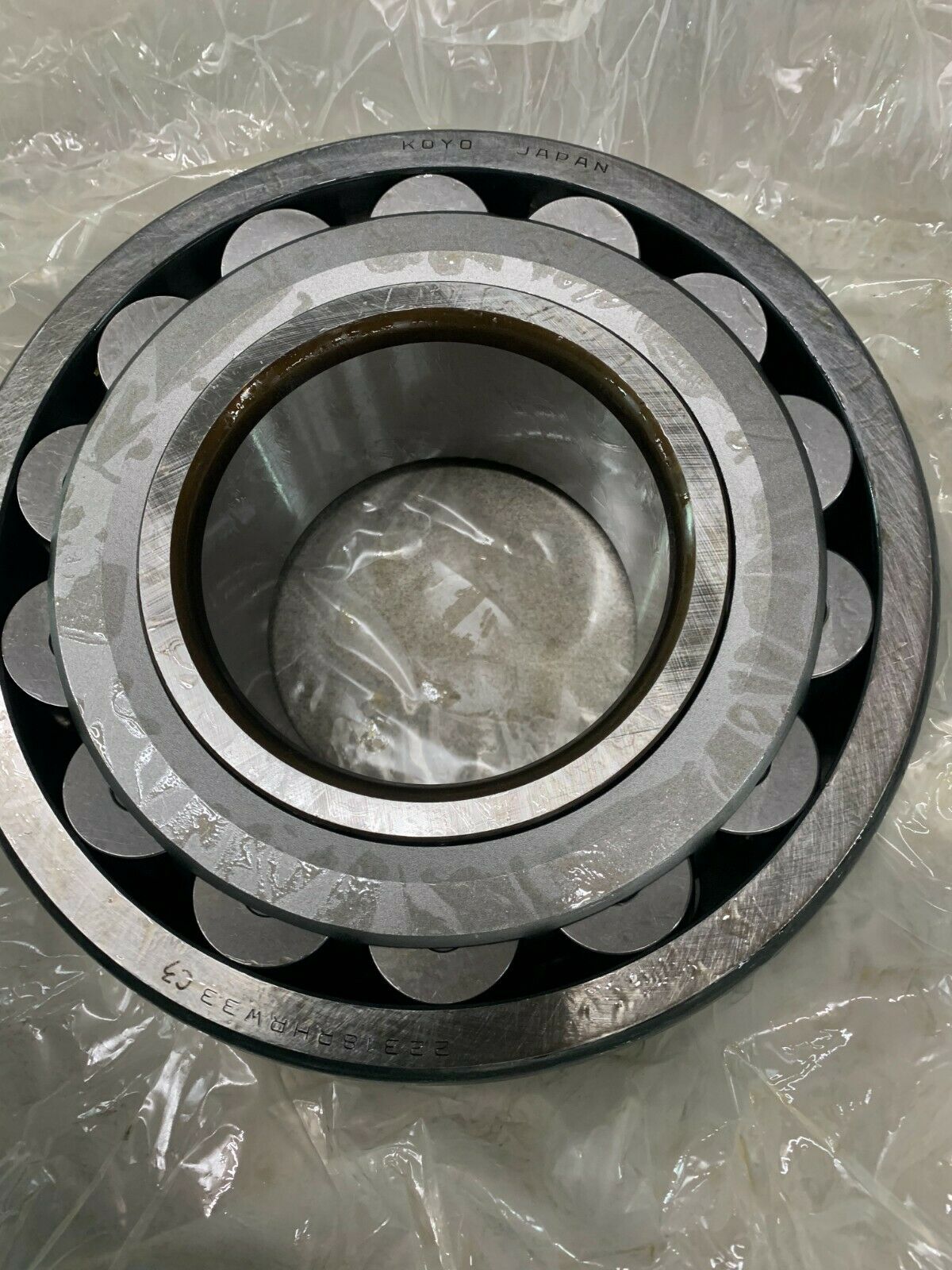 NEW IN BOX KOYO SPHERICAL ROLLER BEARING STRAIGHT BORE 22318RHRW33C3