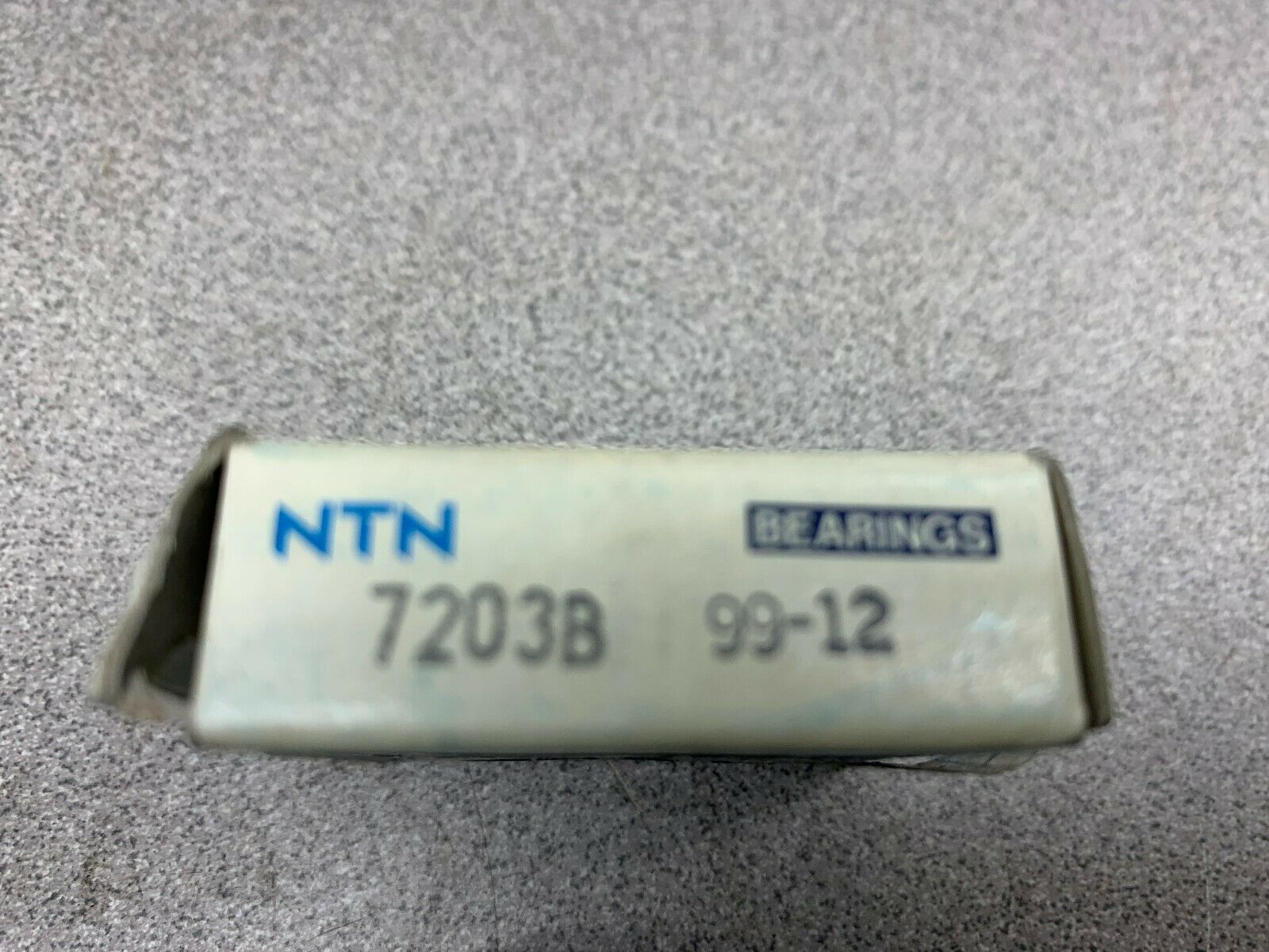 NEW IN BOX NTN BEARING 7203B