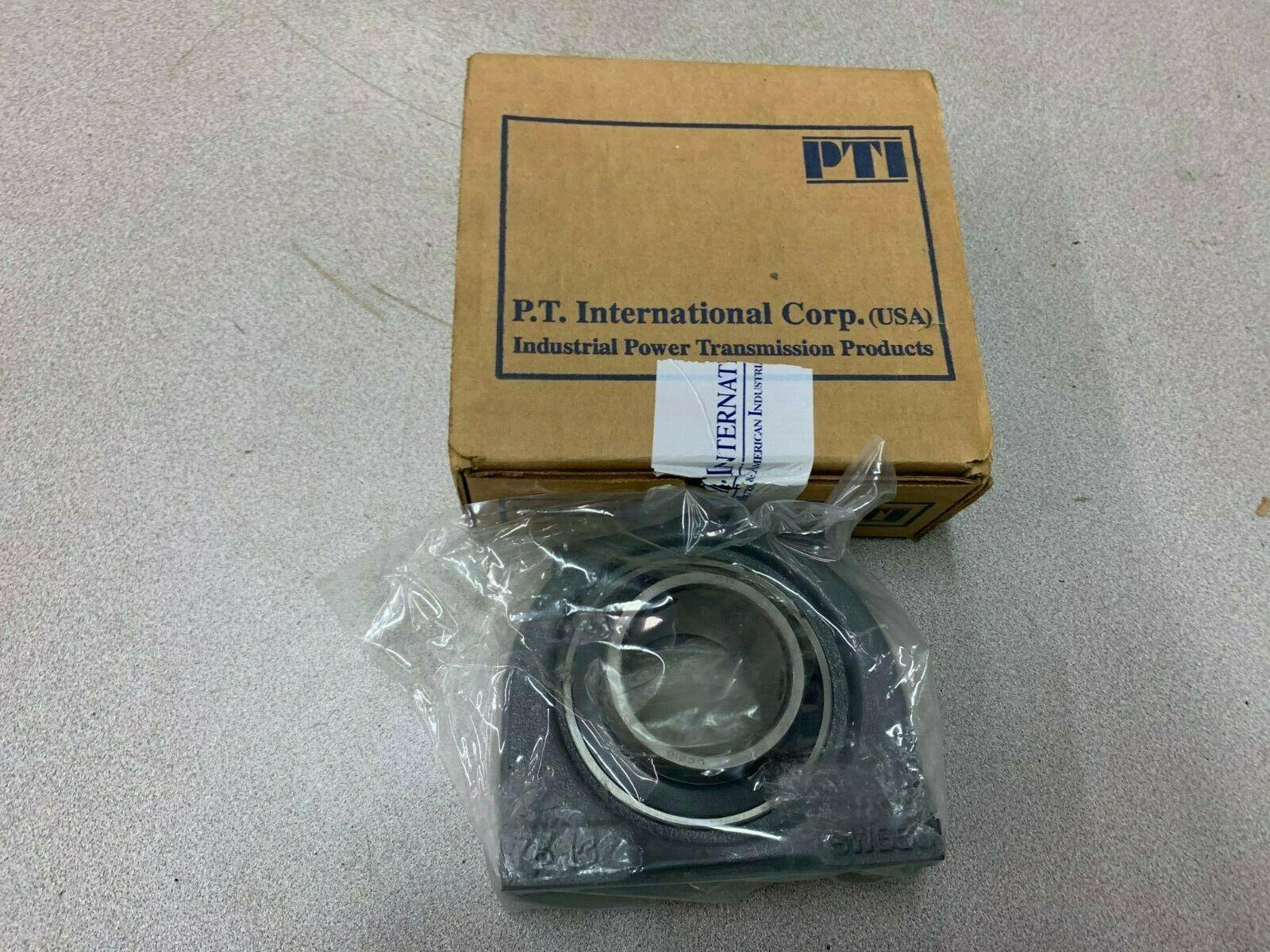 NEW IN BOX PTI TAPPED BASE PILLOW BLOCK BEARING SWG210-50UMM