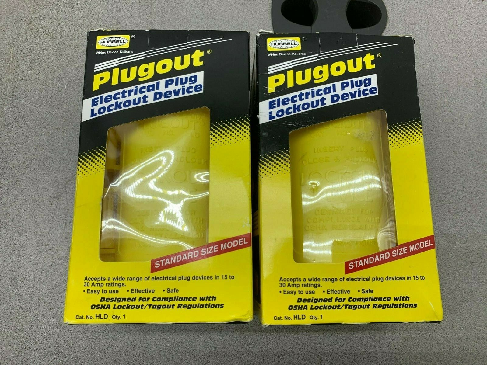 LOT OF 2 NEW IN PACKAGE HUBBELL ELECTRICAL PLUG LOCKOUT DEVICE HLD