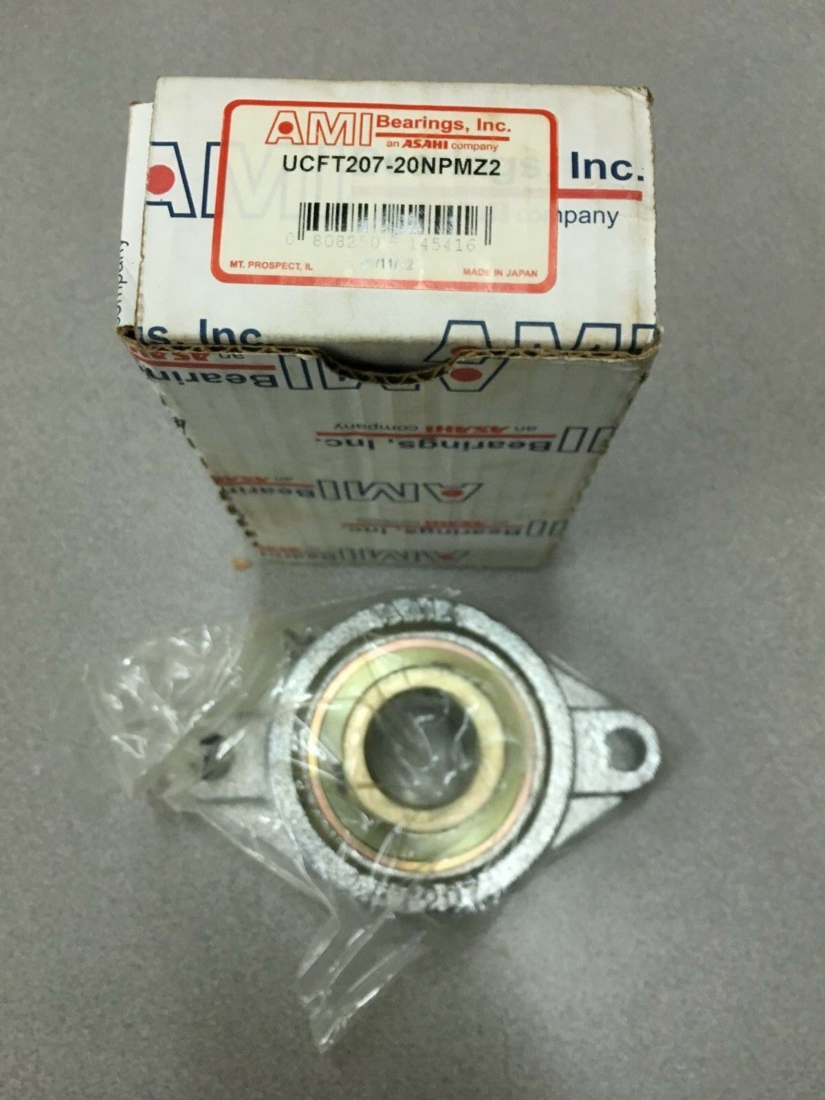 NEW IN BOX AMI FLANGE BEARING UCFT207-20NPMZ2