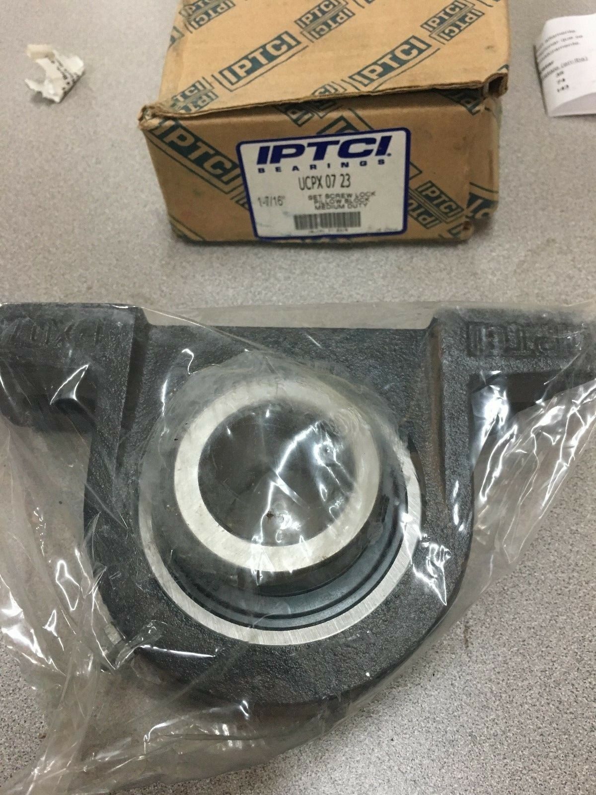 NEW IN BOX IPTCI PILLOW BLOCK BEARING 1-7/16" BORE  UCPX 07 23