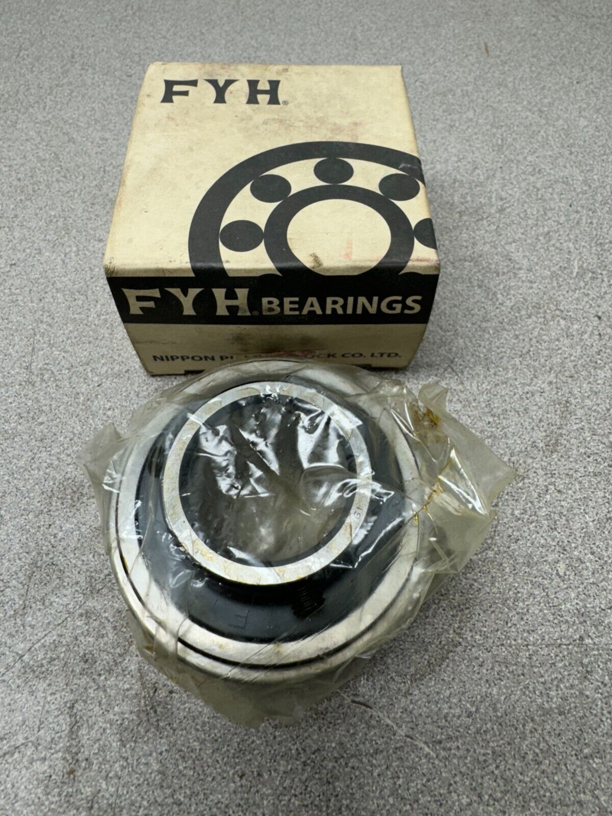 NEW IN BOX FYH BEARING UNIT ER206-19G5