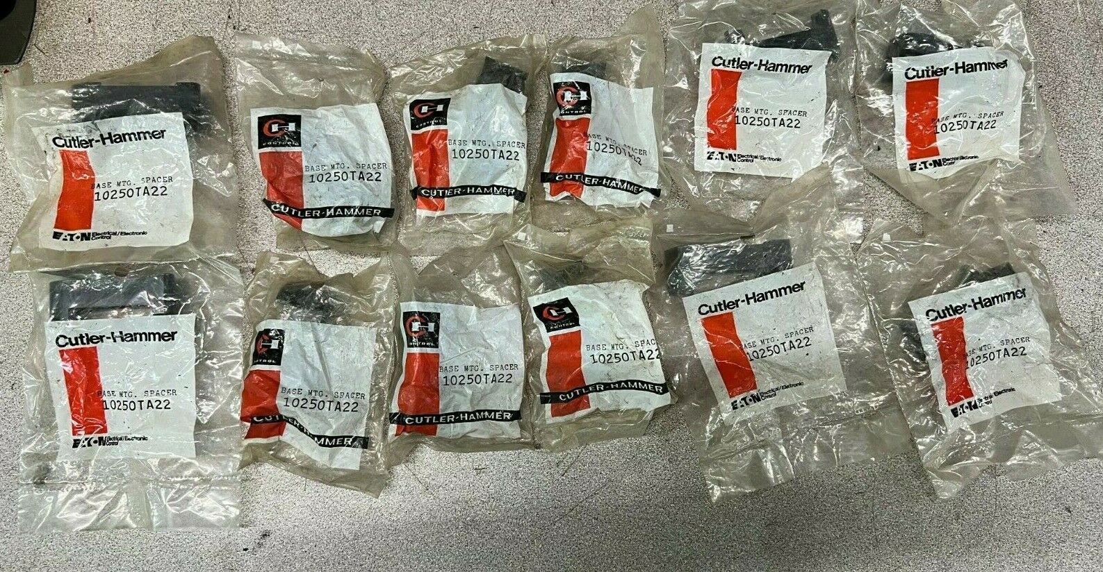 LOT OF 12 NEW IN BAG CUTLER HAMMER BASE SPACER 10250TA22