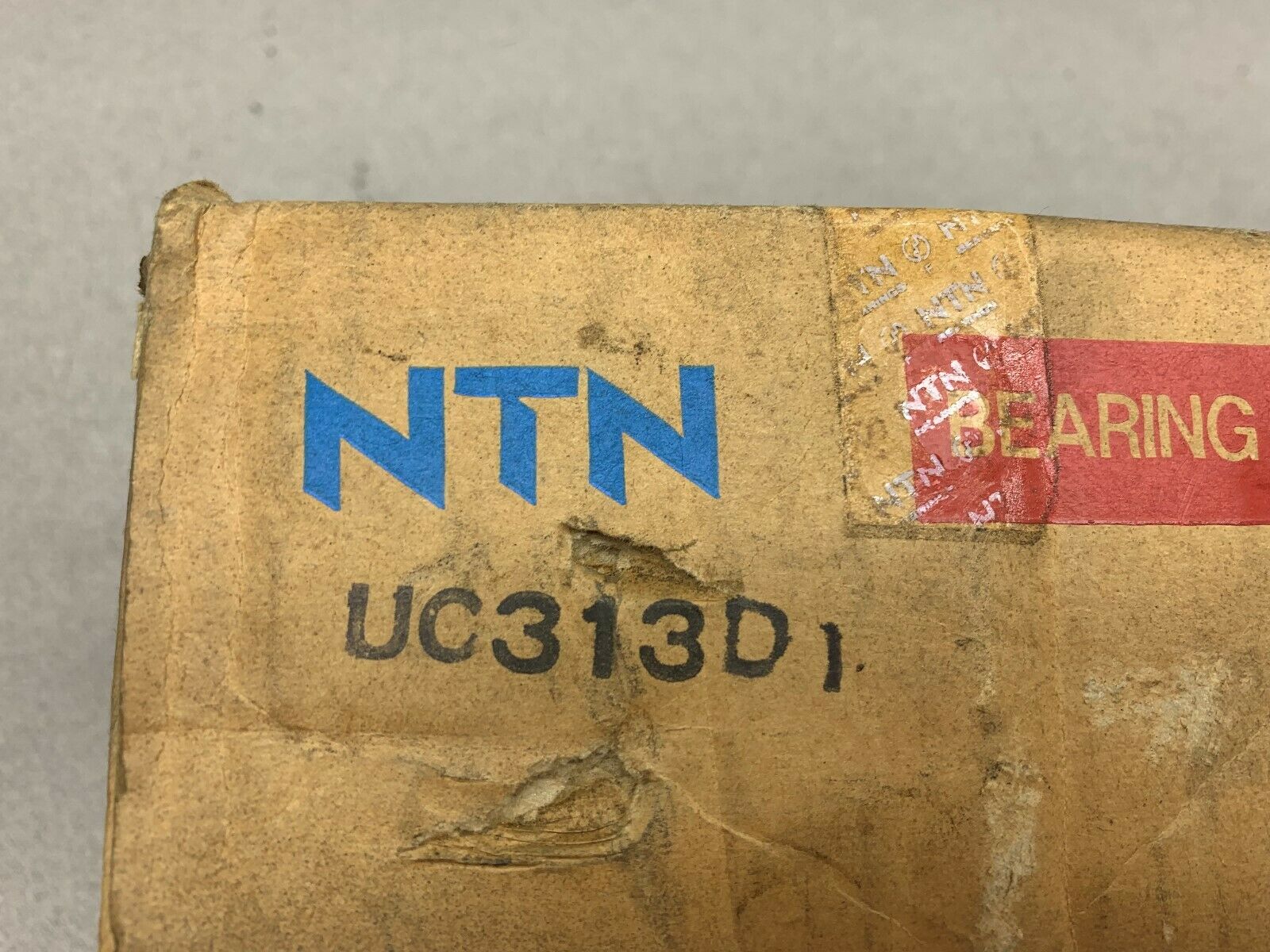 NEW IN BOX NTN BEARING UC313D1