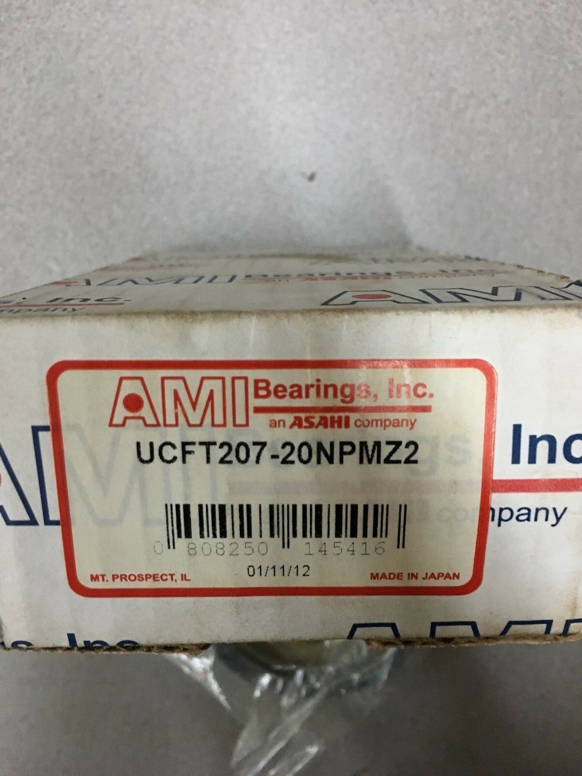 NEW IN BOX AMI FLANGE BEARING UCFT207-20NPMZ2