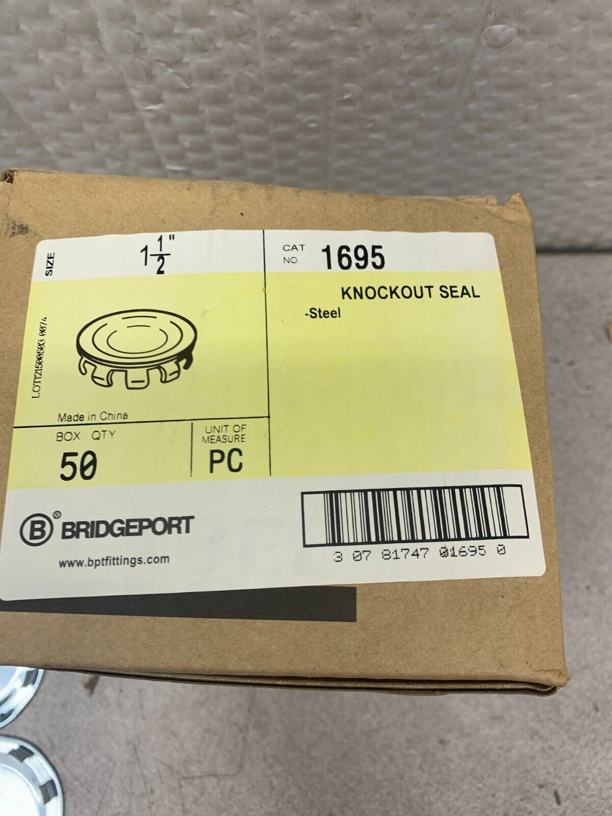 NEW BOX OF 50 BRIDGEPORT 1-1/2" STEEL KNOCKOUTS 1695