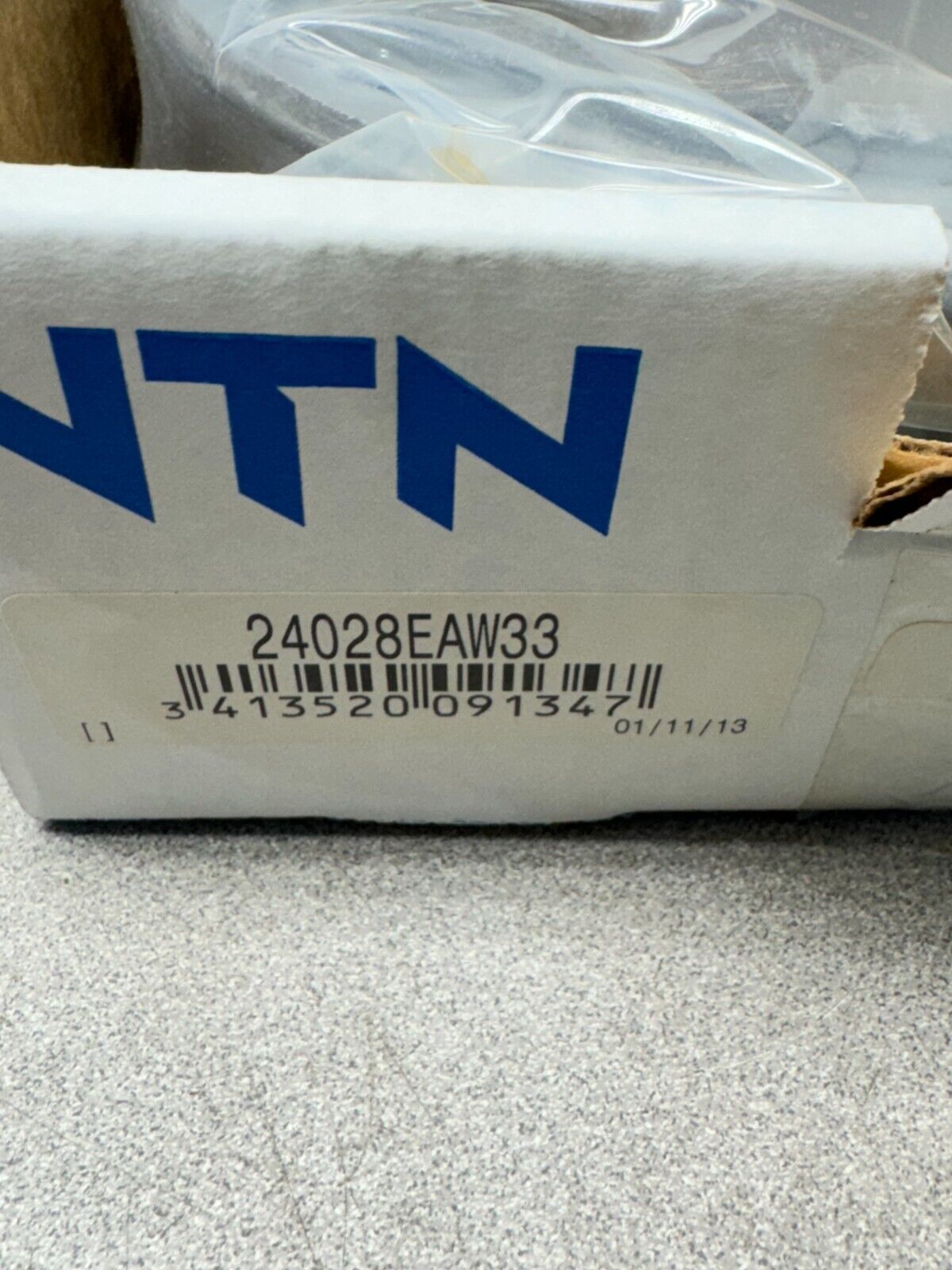 NEW IN BOX NTN SPHERICAL ROLLER BEARING 24028EAW33