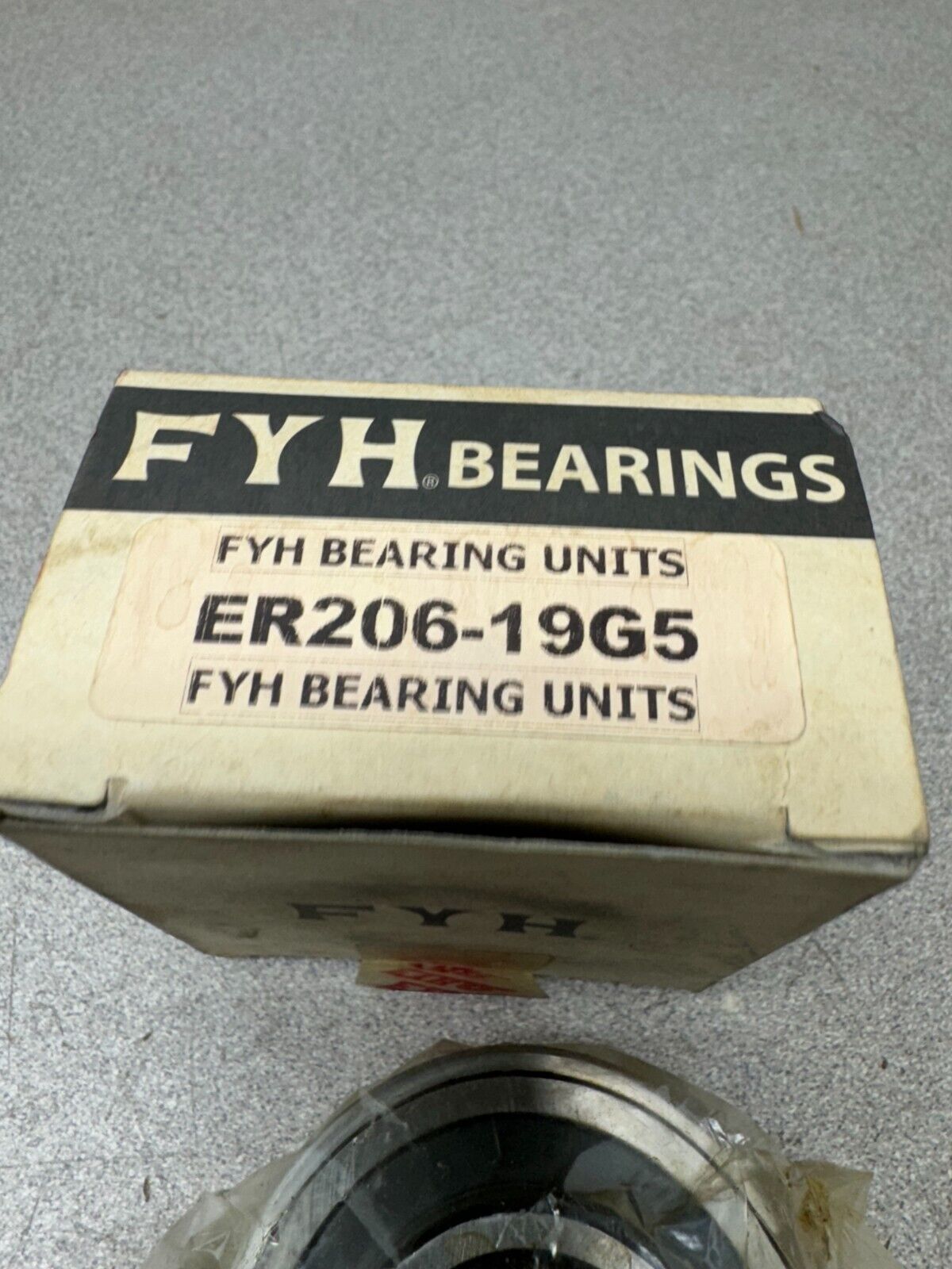 NEW IN BOX FYH BEARING UNIT ER206-19G5