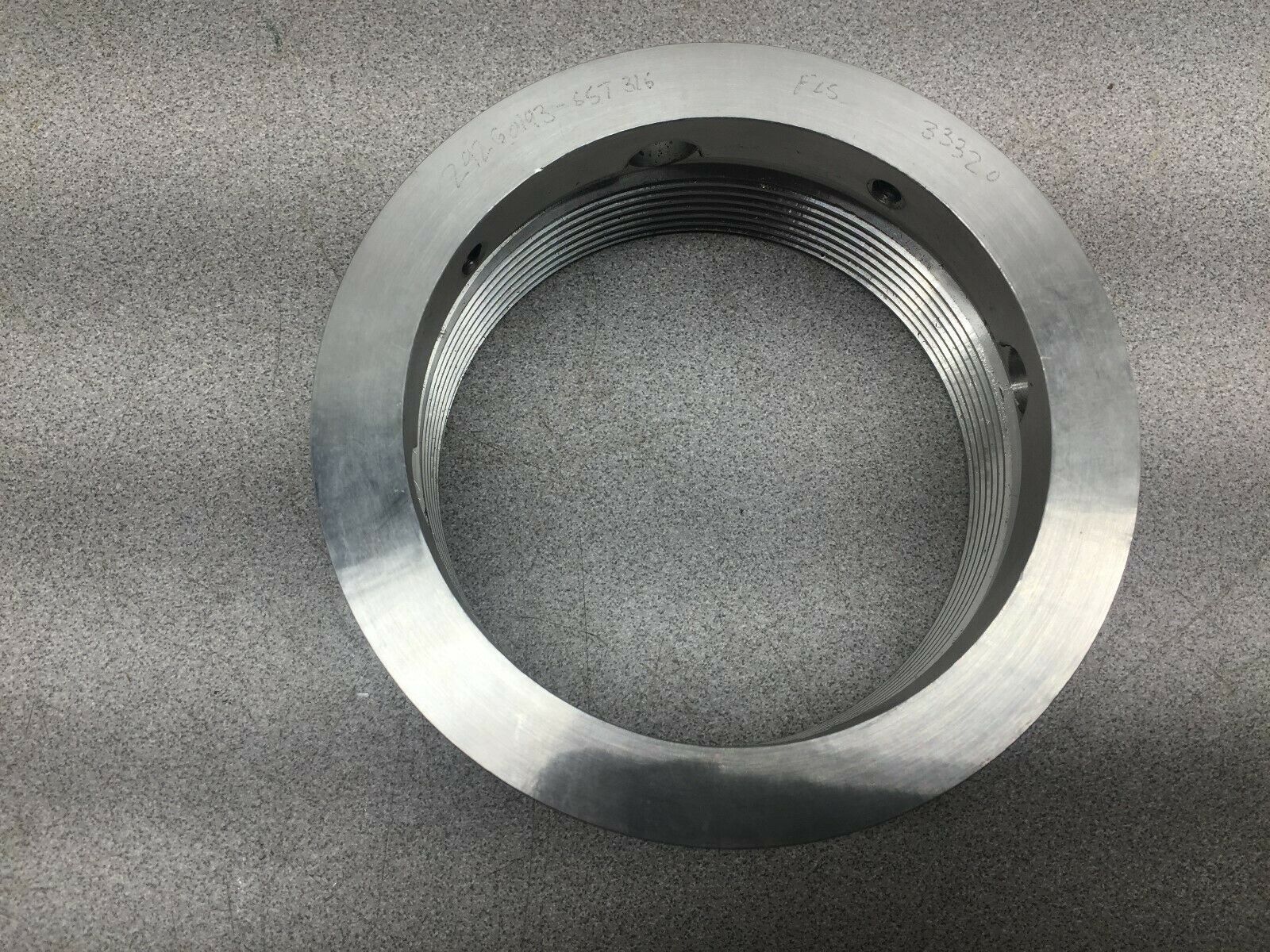 NEW NO BOX FLOWSERVE SLEEVE NUT 29260193