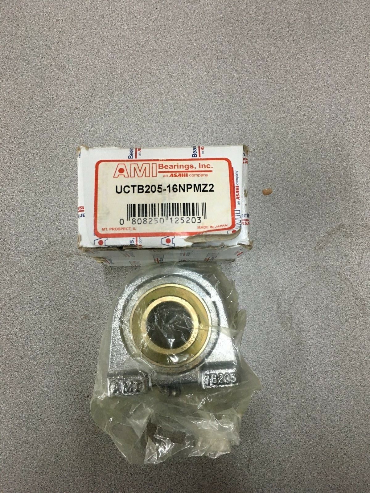 NEW IN BOX AMI BEARING UCTB205-16NPMZ2