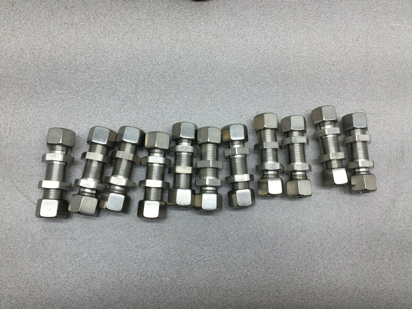 NEW NO BOX LOT OF 11 12MM TUBE SS BULKEHAD FITTINGS 12MM 721 FF-B