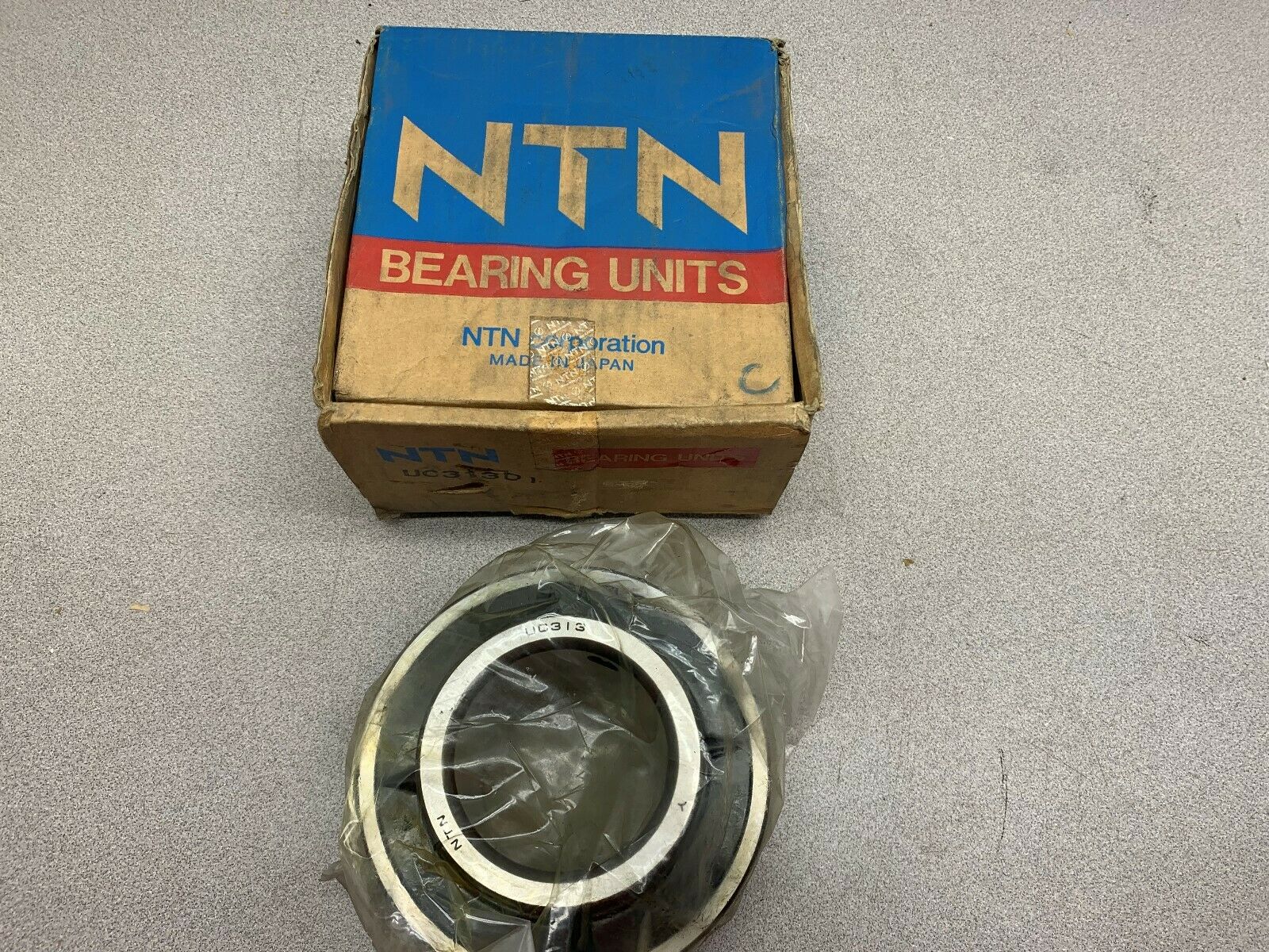 NEW IN BOX NTN BEARING UC313D1