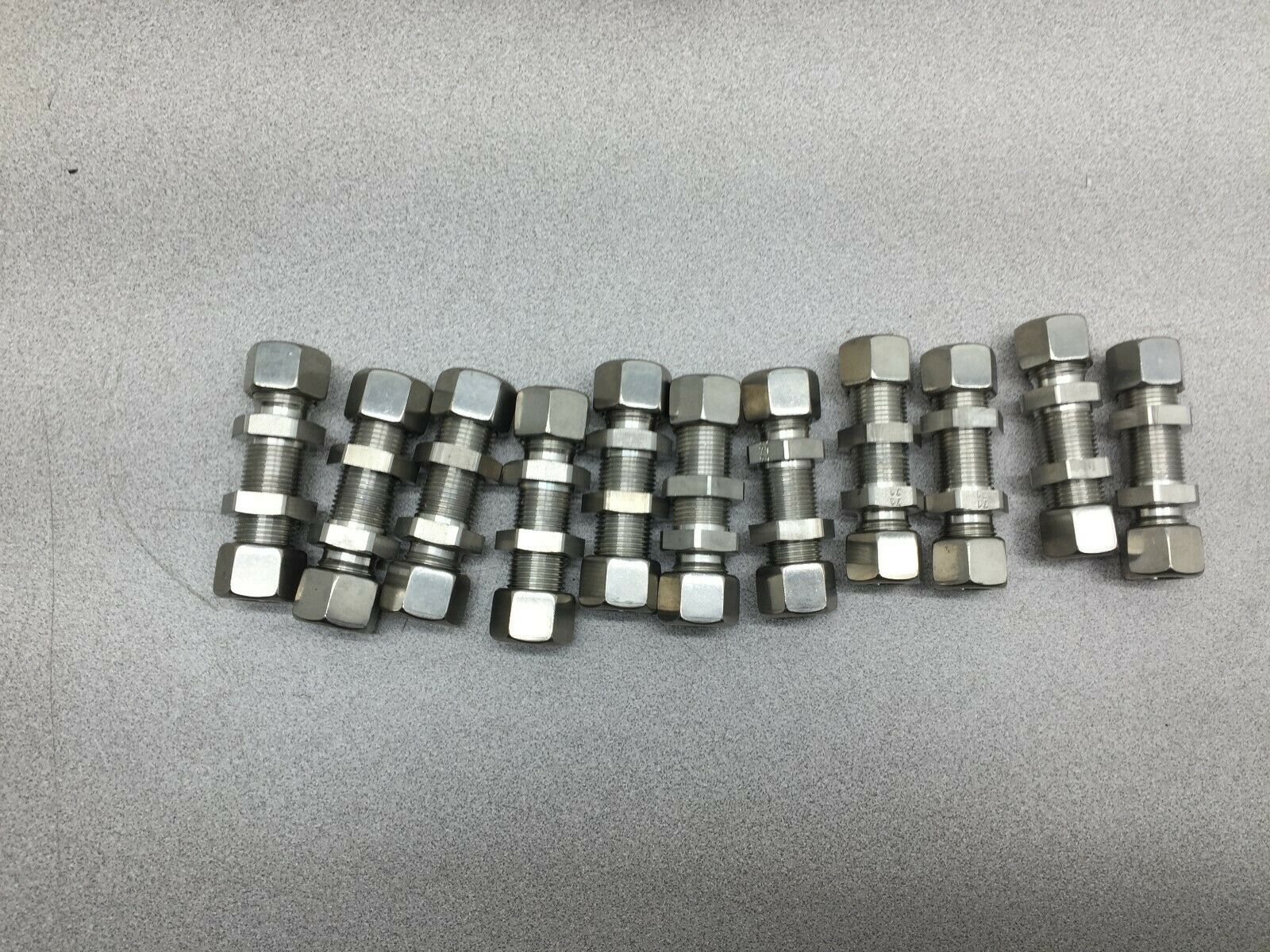 NEW NO BOX LOT OF 11 12MM TUBE SS BULKEHAD FITTINGS 12MM 721 FF-B