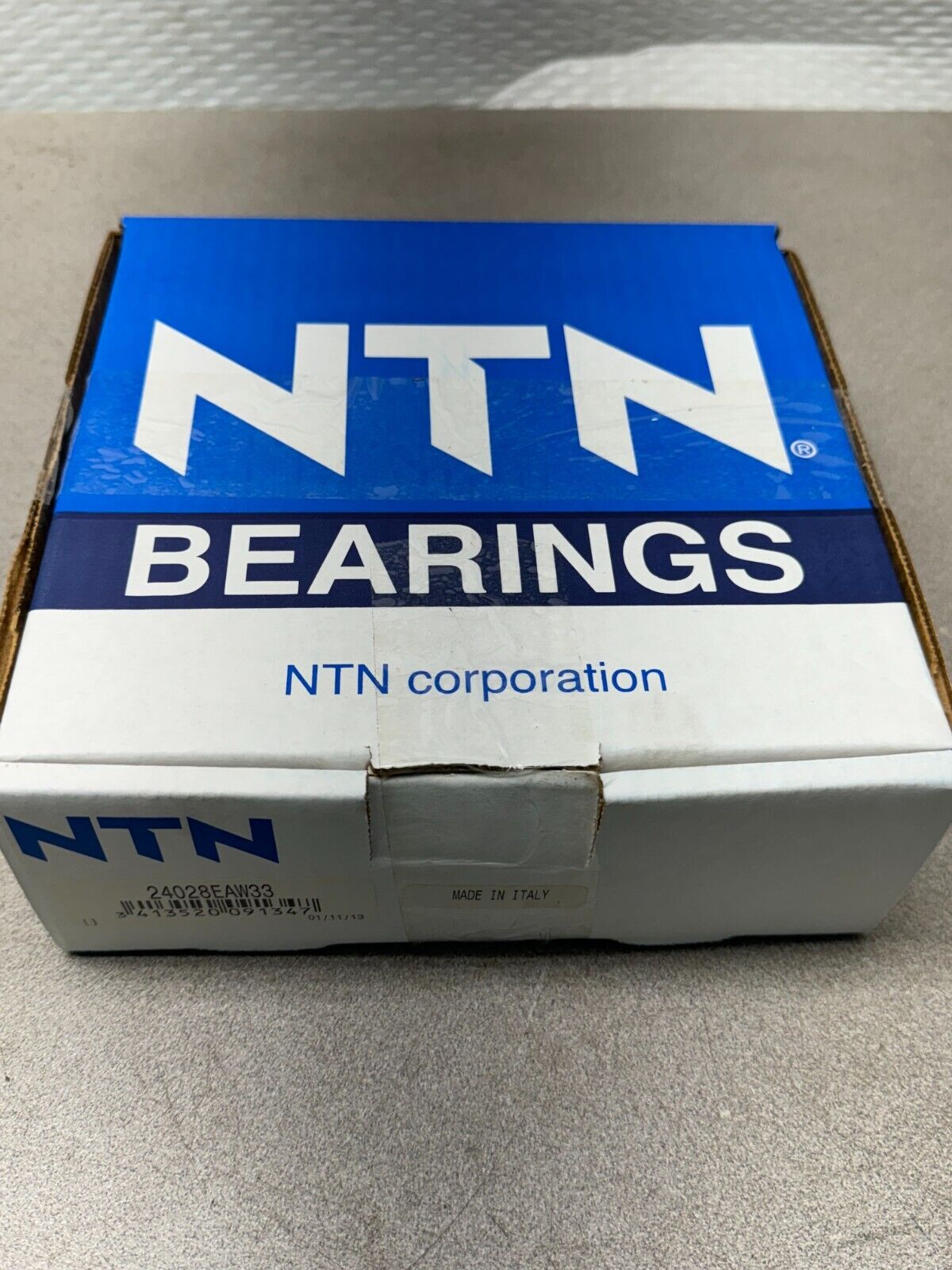 NEW IN BOX NTN SPHERICAL ROLLER BEARING 24028EAW33