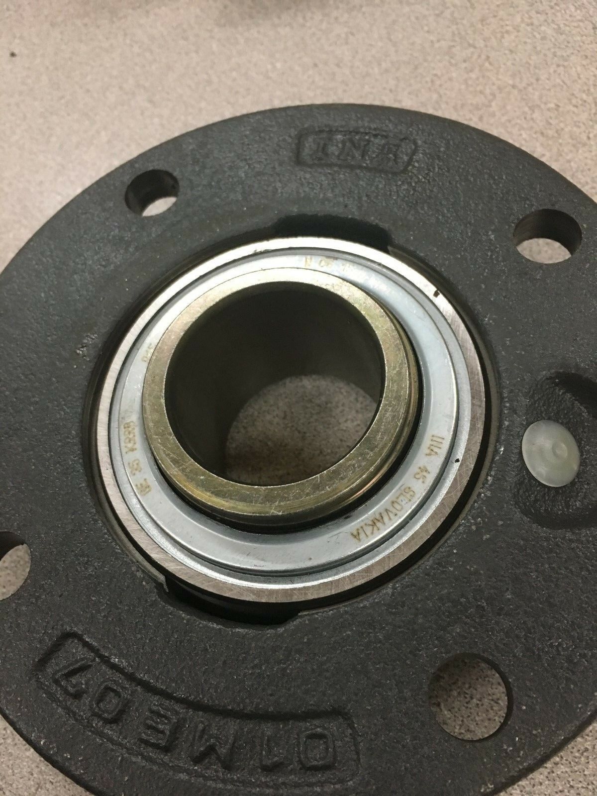 NEW IN BOX INA 4-BOLT SPHERICAL FLANGE BEARING RME35N