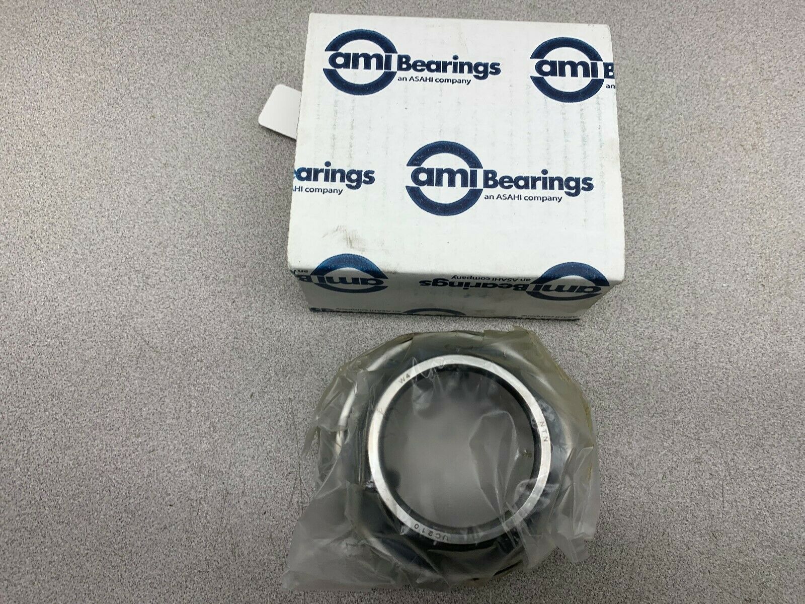 NEW IN BOX AMI BEARINGS UC210