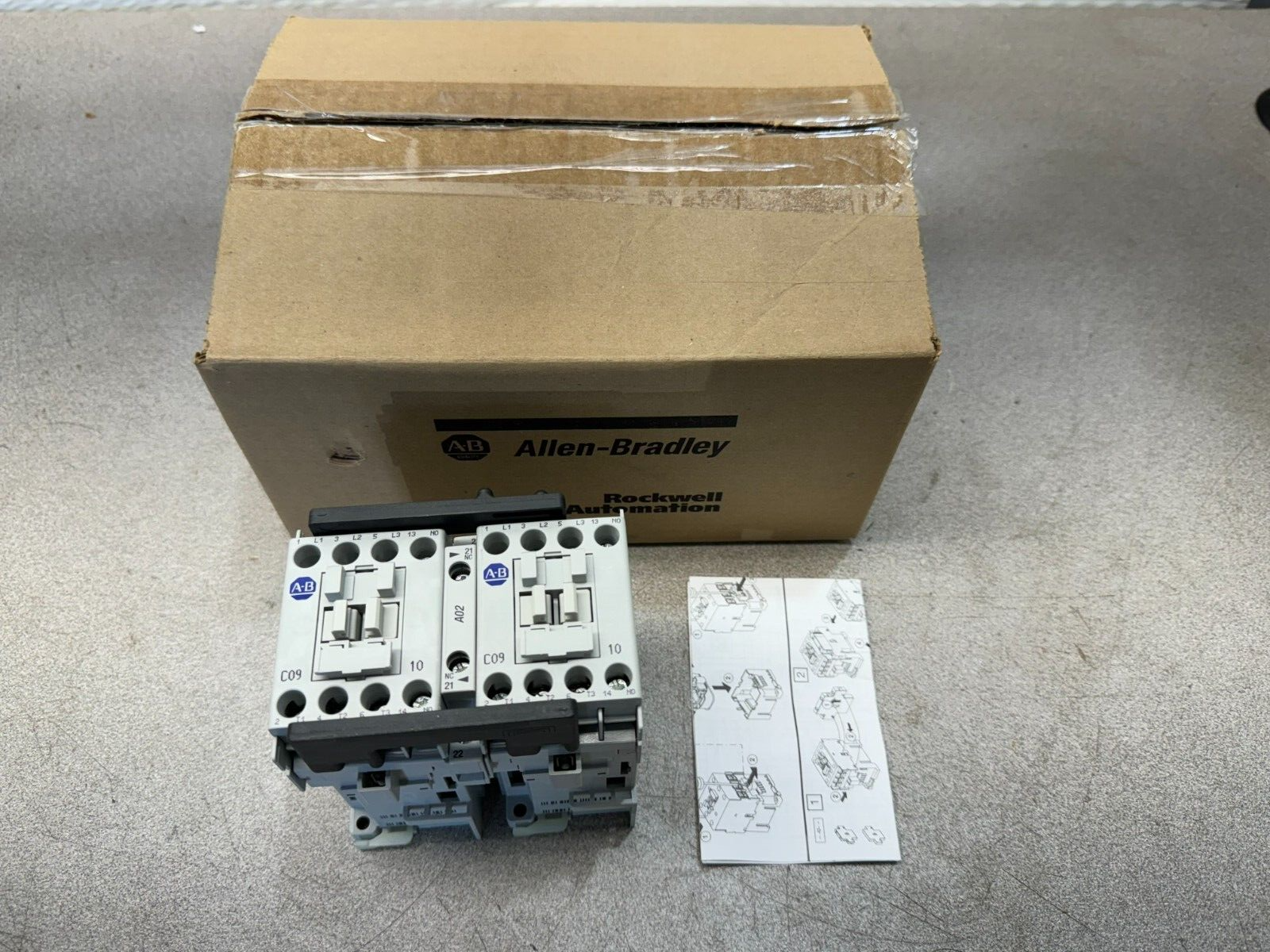 NEW IN BOX ALLEN-BRADLEY 125VDC. REVERSING CONTACTOR 104-C09ZS22 SERIES B