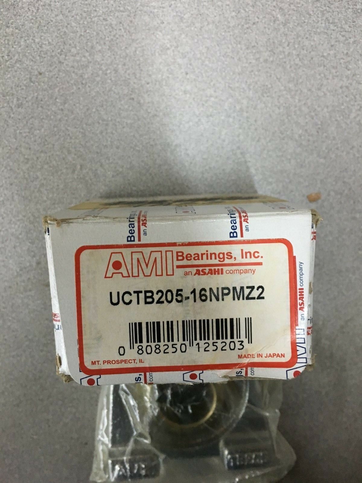 NEW IN BOX AMI BEARING UCTB205-16NPMZ2