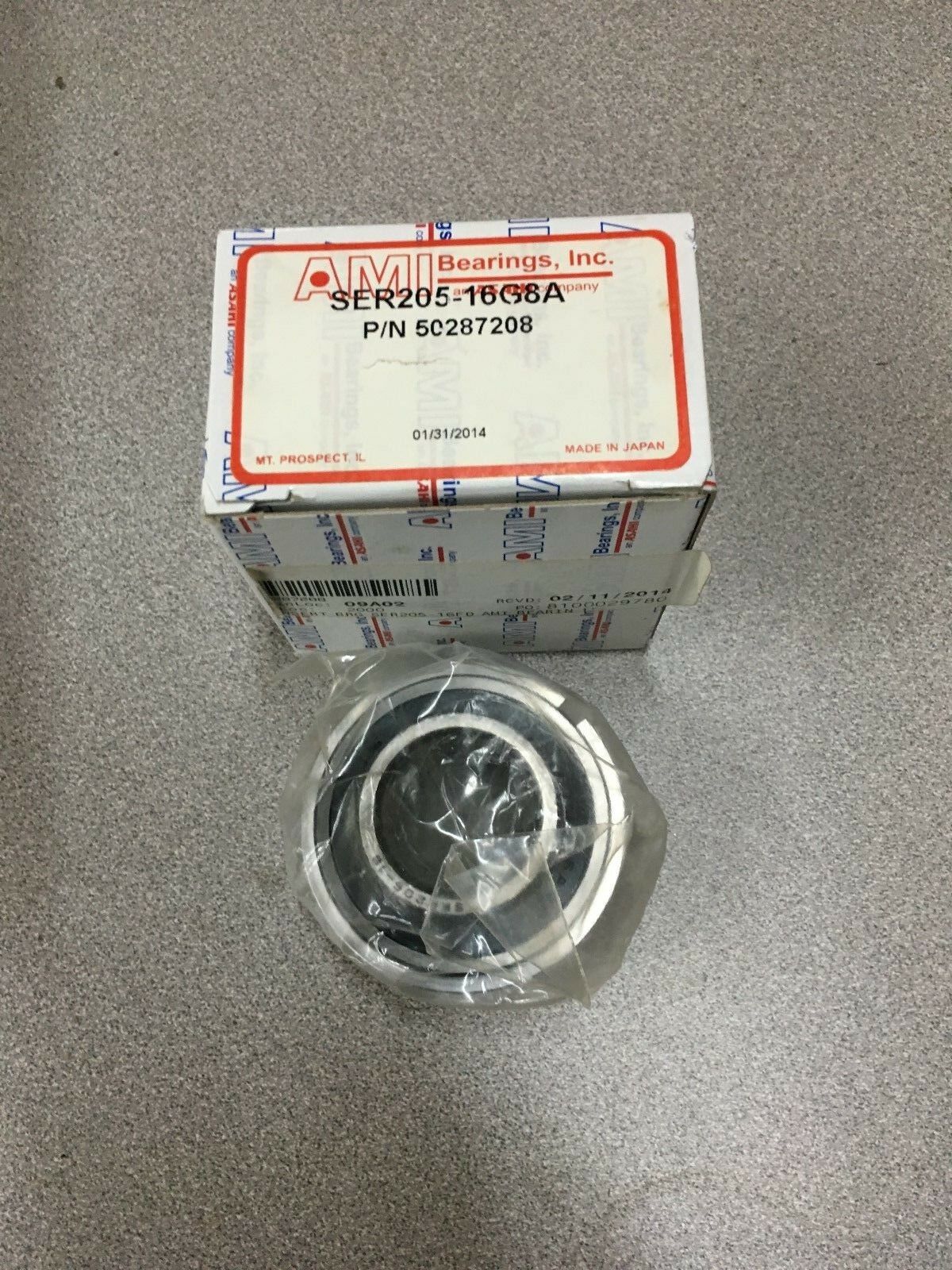 NEW IN BOX AMI BEARING SER205-16G8A