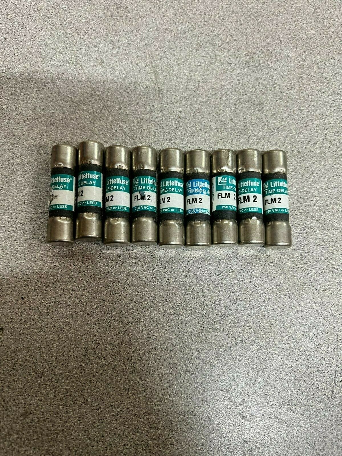 LOT OF 9 NEW NO BOX LITTELFUSE FUSE FLM2